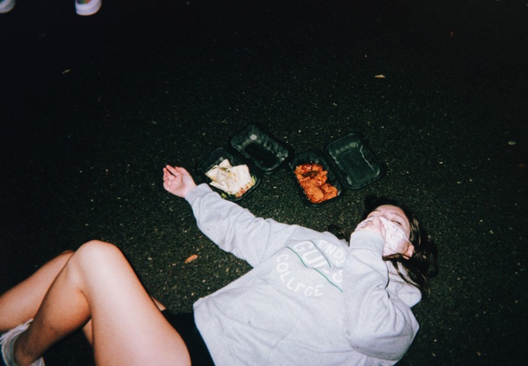 person laying on pavement
